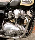 That's no pushrod--just the W650's classically styled cam drive shaft housing.
